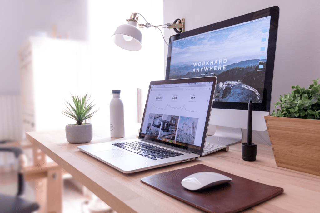 A home office desk setup with a laptop, the kind of room most people actually work in